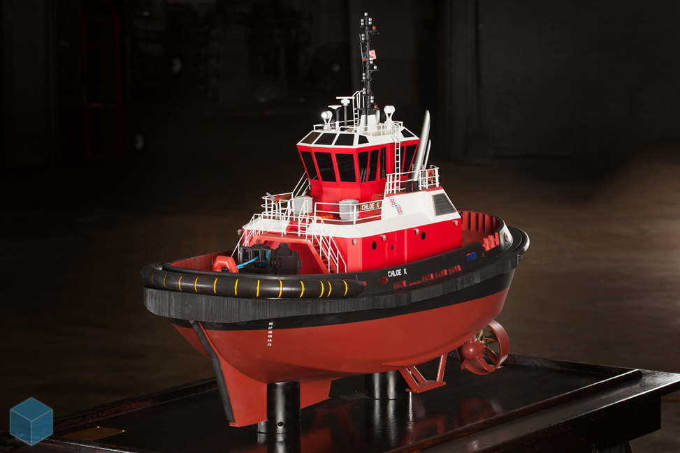 scale model of red and black ship